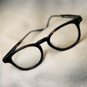 Tom Ford used unisex eyeglasses, brown tortoise-shell frame color